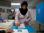 Israelisch-arabische Frau wählt. Quelle: i24
